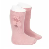 Calcetín alto de algodón liso con borlas rosa palo